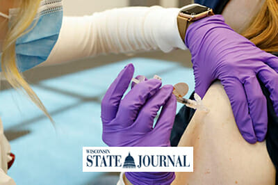 AMI Exxpeditionary Healthcare, Vaccination Wisconsin, State Journal